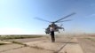 Cette journaliste russe va avoir très chaud au passage d'un hélicoptère en pleine interview