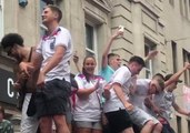 England Fans Dance on Bus Stop Canopy in Nottingham
