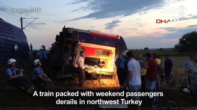 Turkish rescuers attend to passengers after train accident