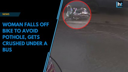 Woman falls off bike to avoid pothole, gets crushed under a bus