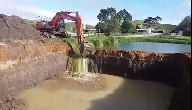 Nitesh Gupta Metworld Trading DMCC Hitachi Zaxis 350 LCH releasing sandstone dam - Copy