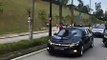 Earlier,  r. Mahathir bin Mohamad arrives at the National Palace in his car, with Proton 2020 plate.