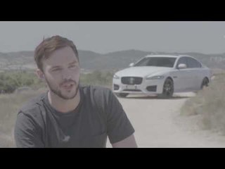 Nicholas Hoult drives Jaguar XF AWD | AutoMotoTV