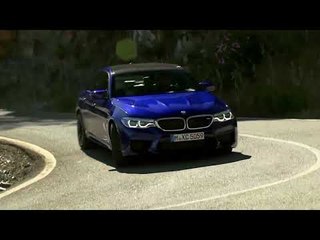 The new BMW M5 with M xDrive Driving in the Country