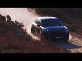 Porsche Cayenne Turbo Driving off road in Moonlight Blue Metallic