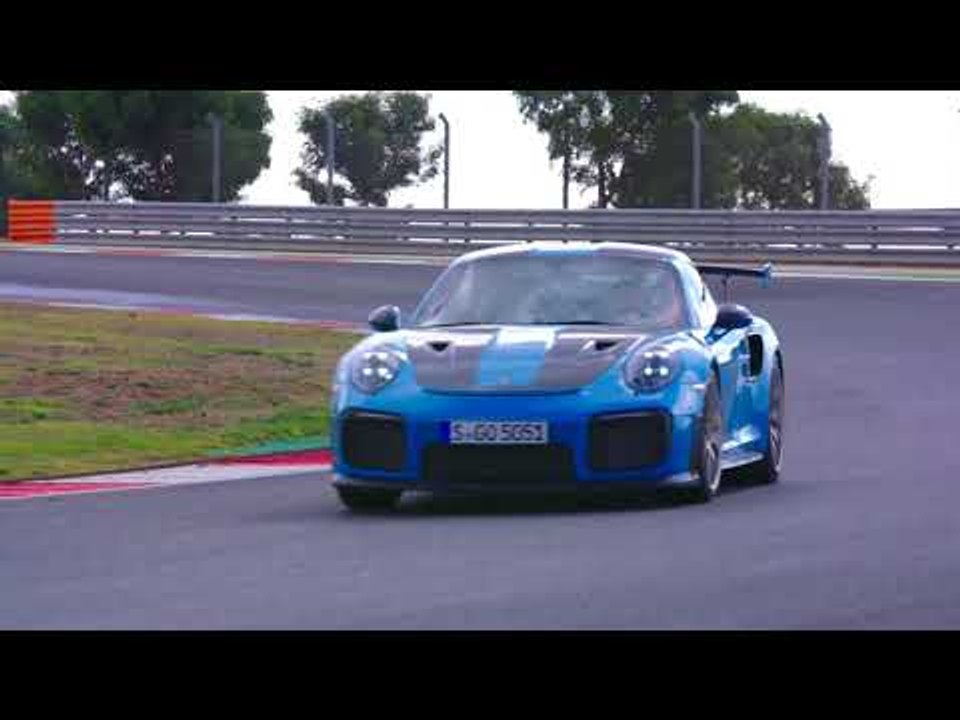 Porsche 911 GT2 RS in Miami Blue Driving on the...