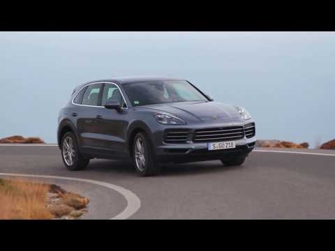 Porsche Cayenne S Biskaya Blue Metallic Driving on the road