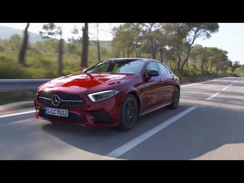 Mercedes-Benz CLS 450 4MATIC in Red metallic Driving in the country