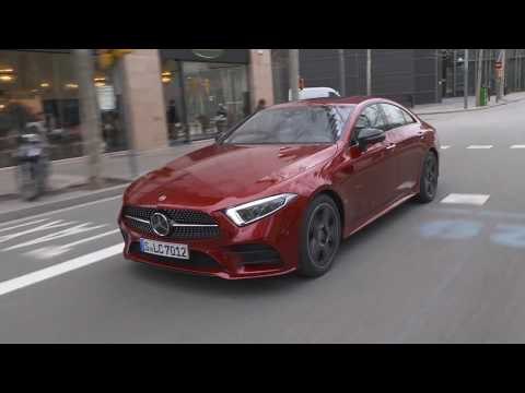Mercedes-Benz CLS 450 4MATIC in Red metallic Driving in the city
