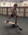 Boy Shows off Hockey Skills on Balance Board