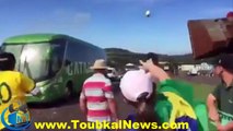 Brazilian fans receive their team with eggs and stones