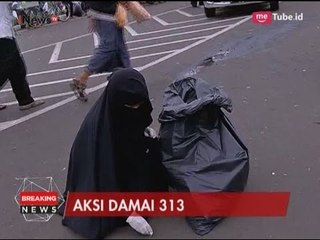 Peserta Aksi 313 Pungut Sampah di Lokasi Orasi Massa - Breaking News 31/03