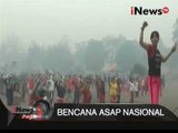 Warga Sampit Berolahraga Di Tengah Kabut Asap Dengan Menggunakan Masker - iNews Pagi 24/09