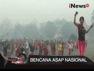 Warga Sampit Berolahraga Di Tengah Kabut Asap Dengan Menggunakan Masker - iNews Pagi 24/09