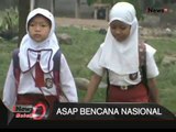 Dampak Kabut Asap, Puluhan Siswa Jatuh Pingsan Saat Upacara Di Merangin, Jambi - iNews Malam 26/10