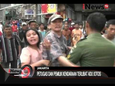 Ricuh razia parkir liar, petugas dan pemilik kendaraan terlibat adu jotos - iNews Pagi 06/01