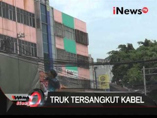 Truk tersangkut kabel - iNews Siang 05/02