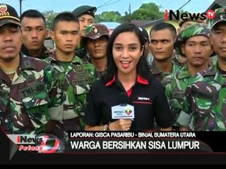 Descargar video: Live Report: Gisca Pasaribu, Warga bersihkan sisa lumpur banjir di Binjai - iNews Petang 11/02