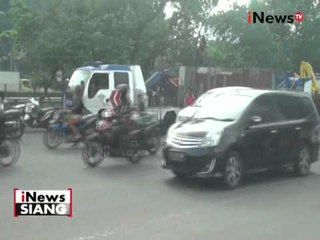 Truk berisi kain berguling di kawasan Tanjung Duren, Jakbar - iNews Siang 27/04