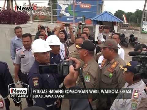 Petugas keamanan menghadang rombongan Wakil Walikota Bekasi - iNews Petang 04/01