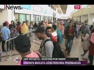 Tải video: Gn. Agung Erupsi, Beberapa Maskapai di Bandara Ngurah Rai Menunda Penerbangan - iNews Sore 26/11