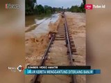 [Video Amatir] Penampakan Rel Kereta Menggantung Akibat Diterjang Banjir Badang - iNews Pagi 24/02