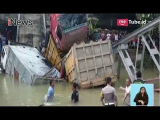 Tải video: Evakuasi Terkendala Crane, 3 Truk Masih di Dasar Sungai Bengawan Solo - iNews Siang 18/04