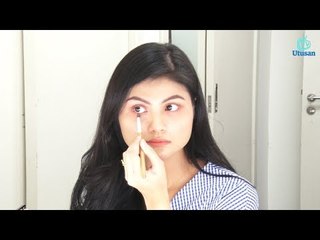 Mekap menutup lingkaran gelap bawah mata