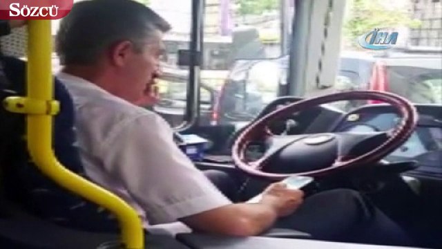 Seyir halindeyken mesajlaşan otobüs sürücüsü kamerada