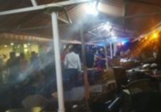 Restaurant Workers Clean up Debris After French Football Fans Stampede in Nice