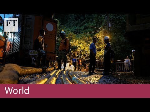 Rescuers seek ways to free trapped boys in Thai cave