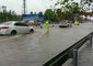 Chengdu Police Direct Traffic as Rain Floods City Streets