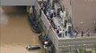 WATCH: Japanese stranded amid massive floods are rescued by airlifts and boats as efforts to save lives intensify. cna.asia/2zmtEu9(Video: Reuters)