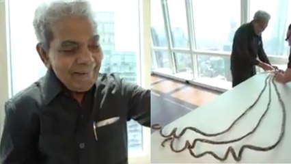 நகத்தால் கின்னஸ் சாதனை புரிந்த இந்தியர் நகத்தை வெட்டினார்!- வீடியோ