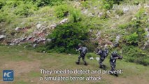 A team of scouts with the Chinese armed police forces have conducted an anti-terror drill in Guangxi. The comprehensive drill aims to enhance their capability o
