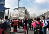 Bystanders Gather Around Collapsed Shopping Mall in Mexico City