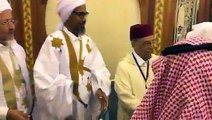 Minister of Islamic Affairs of Saudi Arabia Dr. Abdullatif bin Abdul Aziz Al-Asheikh greets religious scholars attending the International Ulema Conference on P