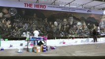 Thai artists paint giant mural of Thai cave rescue