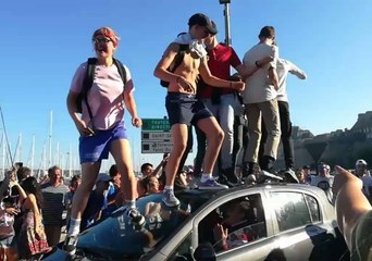 Driver Unimpressed as People Jump on His Car During World Cup Celebrations in France