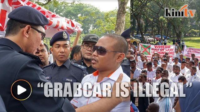 Taxi drivers protest near Parliament, furious over Grab
