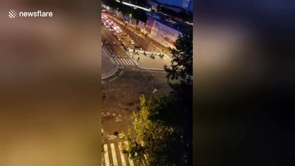 Riot police charge France supporters in Lyon after victory in final