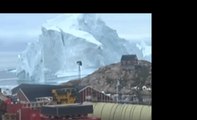 Chunk of Stray Iceberg Looming Over Greenland Town Collapses Into Ocean