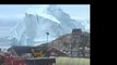 Chunk of Stray Iceberg Looming Over Greenland Town Collapses Into Ocean