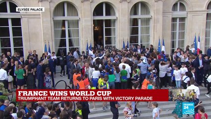 French players greet fans at the Élysée Palace