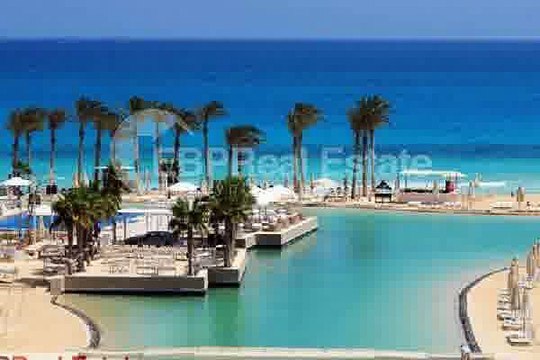 واتر فيلا مستقلة بحمام سباحة للبيع فى هاسيندا باي الساحل الشمالى