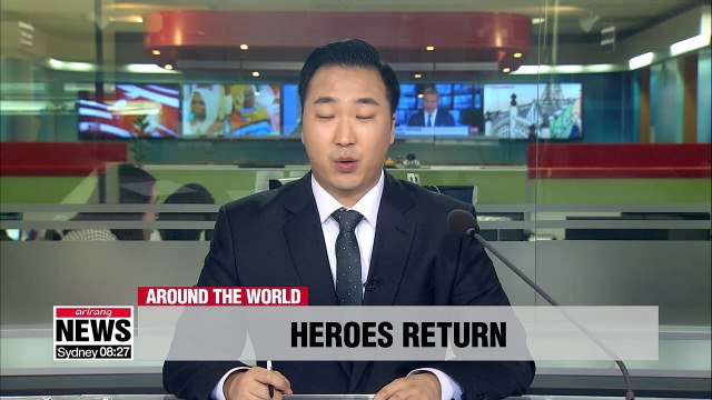 Thousands gather in Paris to welcome back World Cup champions