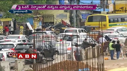 heavy traffic jam in shaikpet due to fly over construction