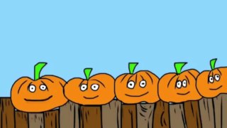 5 little pumpkins sitting on a gate