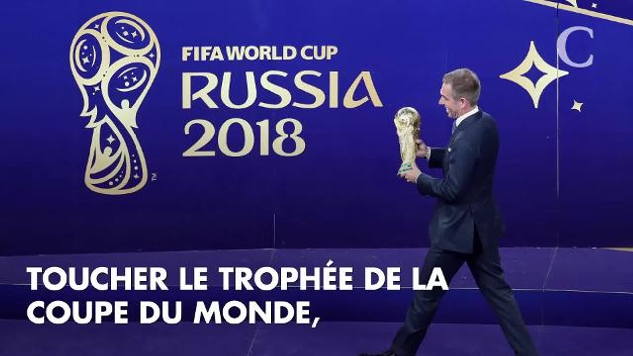 PHOTOS. Pamela Anderson : la compagne d'Adil Rami a elle aussi touché la Coupe du monde avec un sourire XXL