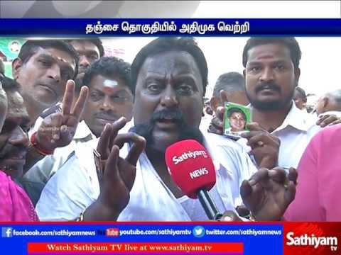 ADMK celebrates by distributing sweets